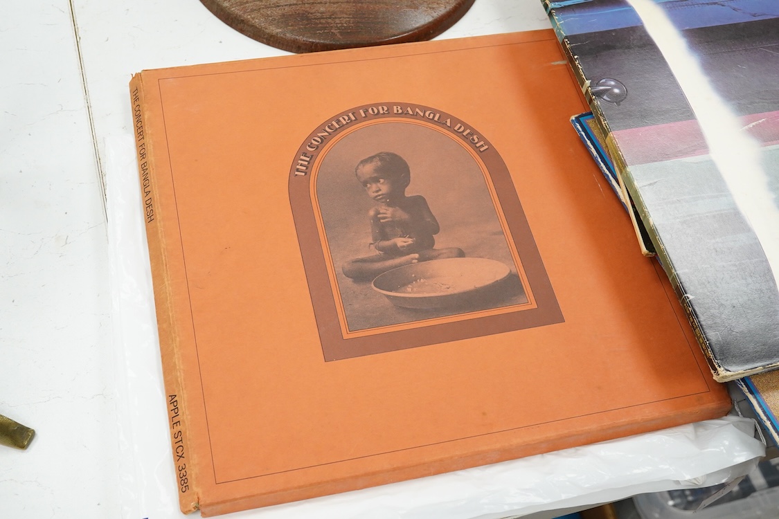 Fourteen The Beatles related LP record albums, including; Rubber Soul, The Beatles at the Hollywood Bowl, With The Beatles, Beatles For Sale, Sgt. Pepper, Revolver, McCartney II, Wings Over America, the Concert for Bangl